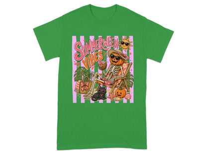 Skeleton pumpkin with "Summerween Vibes" text and beach elements on a green t-shirt.