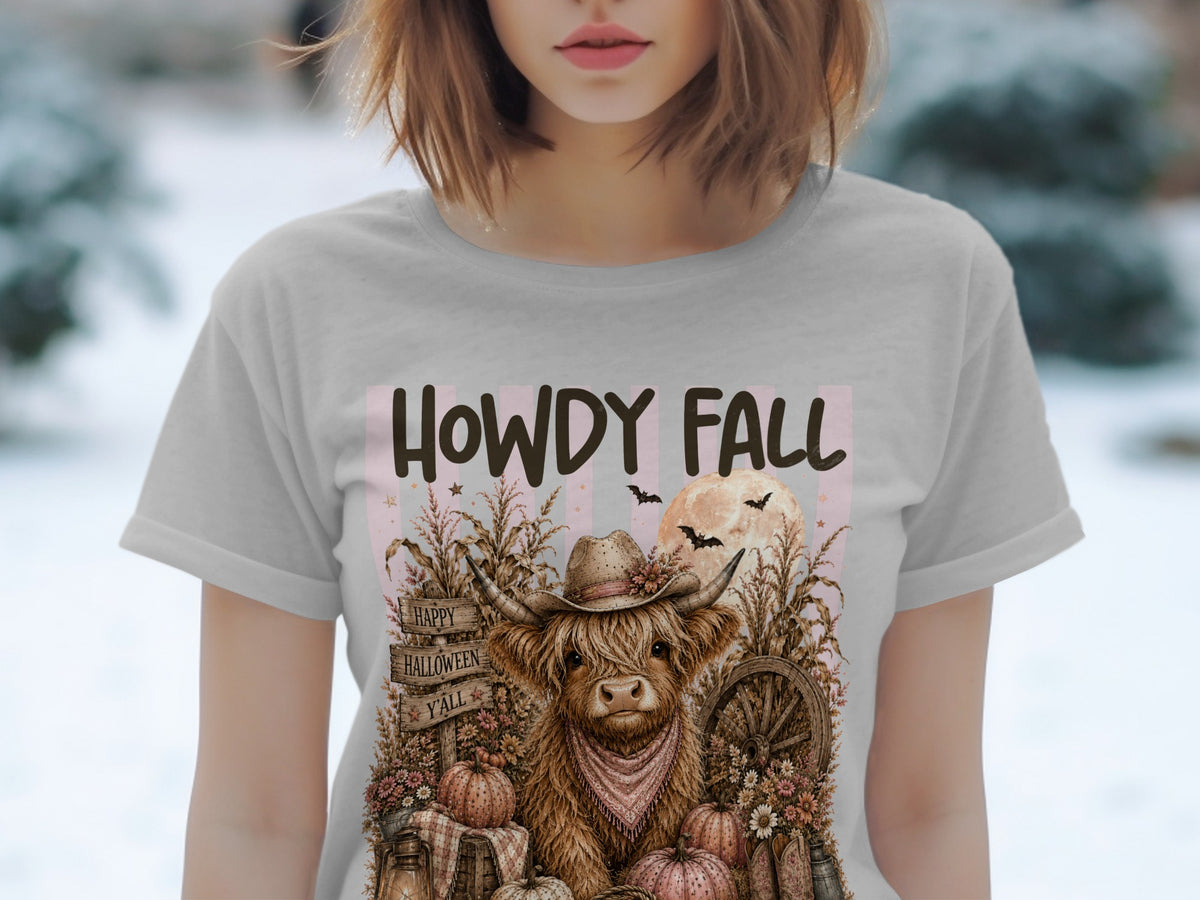 Cow wearing cowboy hat with "Howdy Fall" text and Halloween scene.