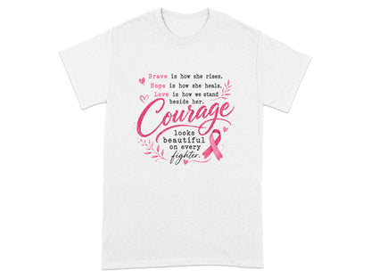 White t-shirt with "Courage looks beautiful on every fighter" text and pink ribbon.