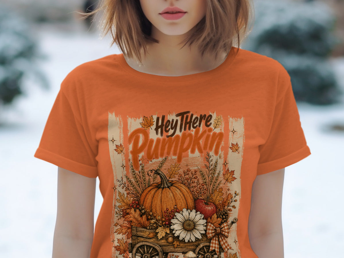 Orange t-shirt with "Hey There Pumpkin" text and autumn harvest design.