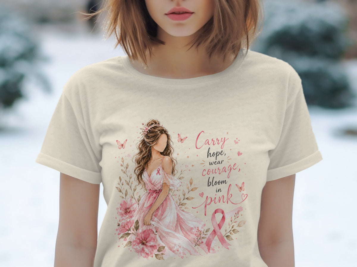 T-shirt with artwork of a woman in a pink dress and the text "Carry hope, wear courage, bloom in pink."