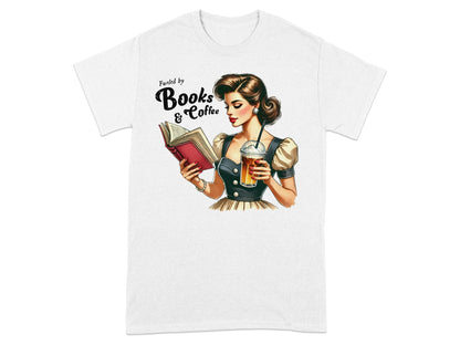 T-shirt graphic: Woman reading book holding iced coffee, text "Fueled by Books & Coffee".