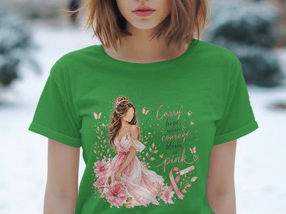 Green t-shirt with woman in pink dress, pink ribbon, and "Carry hope, wear courage, bloom in pink" text.
