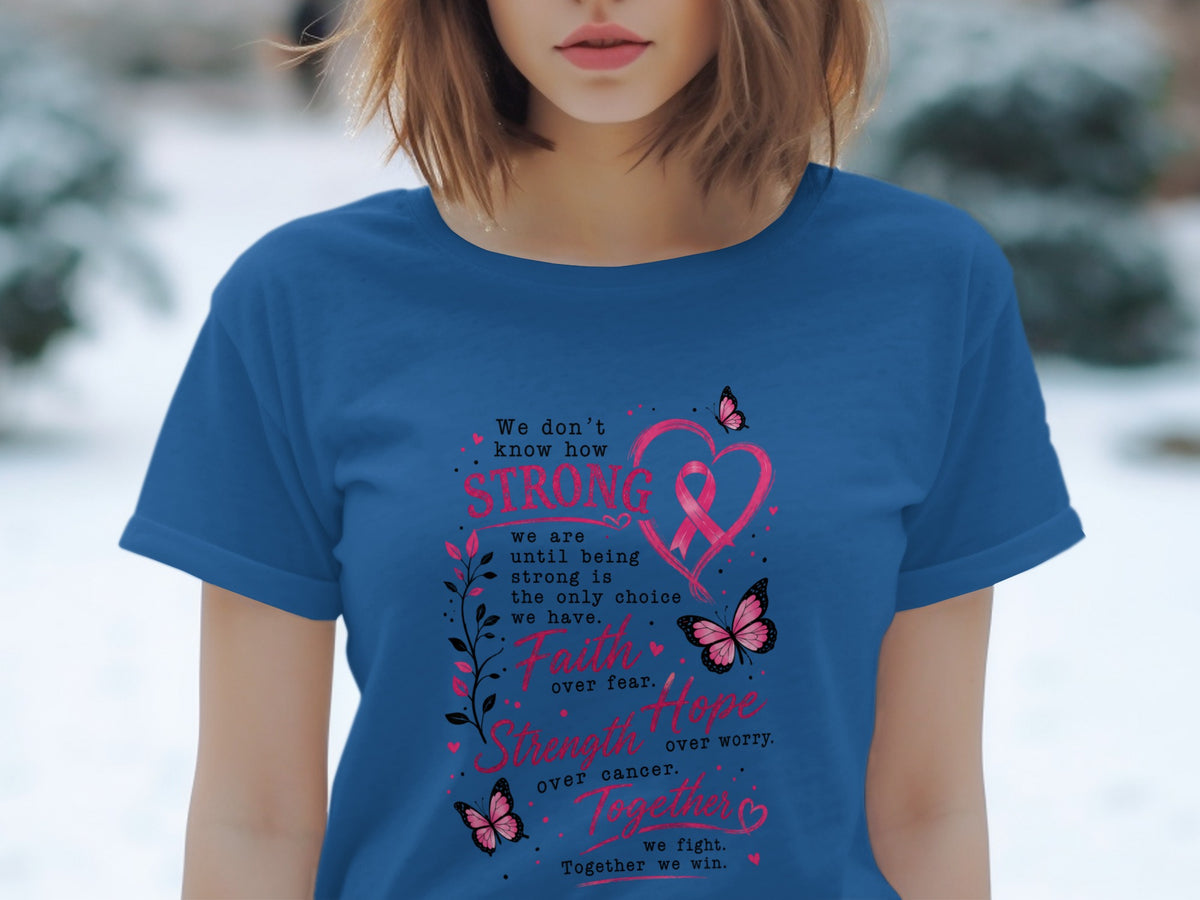 Blue t-shirt with text about strength, faith, hope, and fighting cancer.