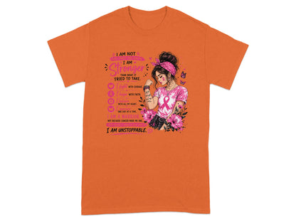 Orange t-shirt with "I am stronger than what it tried to take. I am unstoppable."