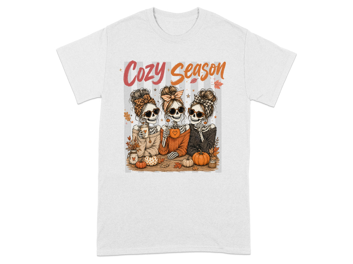 Three skeletons wearing scarves and sunglasses, with text "Cozy Season".
