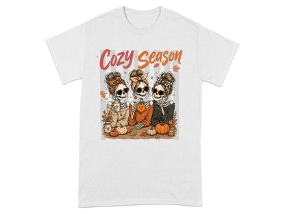 Three skeletons wearing scarves and sunglasses, with text "Cozy Season".