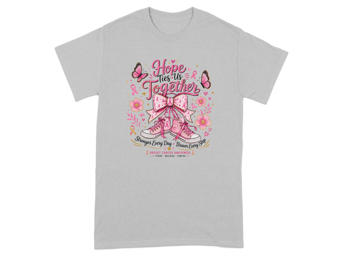 "Hope Ties Us Together" graphic on grey t-shirt with pink sneakers and breast cancer awareness ribbon design.