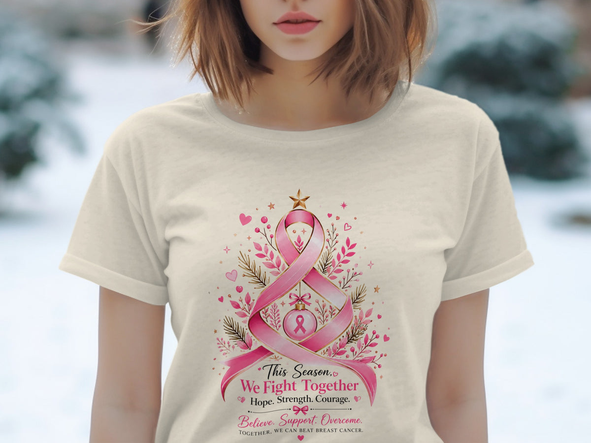 Cream t-shirt with pink breast cancer ribbon design and motivational text.