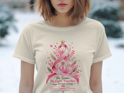 Cream t-shirt with pink breast cancer ribbon design and motivational text.
