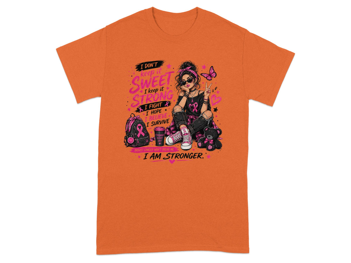 Orange t-shirt with a graphic of a woman and breast cancer awareness elements.