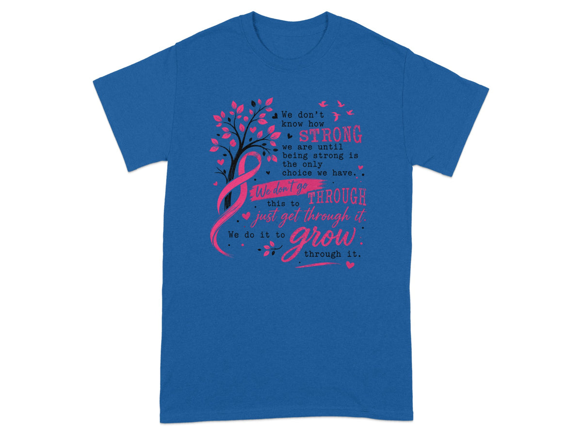 Blue t-shirt with pink breast cancer ribbon and empowering quote about strength.