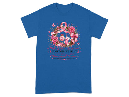 Blue t-shirt with holiday wreath, pink ribbons, and text: "Hope Lights the Season. Together We Fight. Believe Support Overcome. Together, we can beat breast cancer."