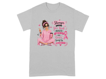 Woman in pink with coffee cup and text: Stronger, You Think, Braver Than You Feel, Never Giving Up, Hope, Fight, Cure.