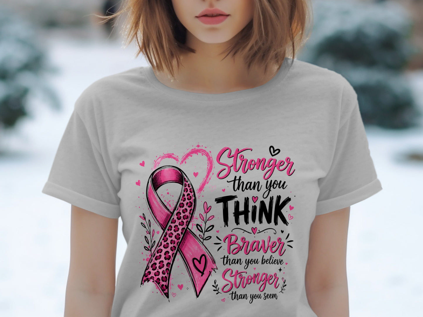 Grey t-shirt with pink breast cancer ribbon and "Stronger than you THINK Braver than you believe Stronger than you seem" text.