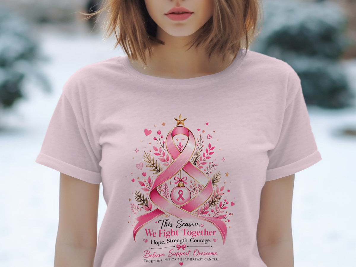 Pink t-shirt with breast cancer ribbon design and inspirational text.