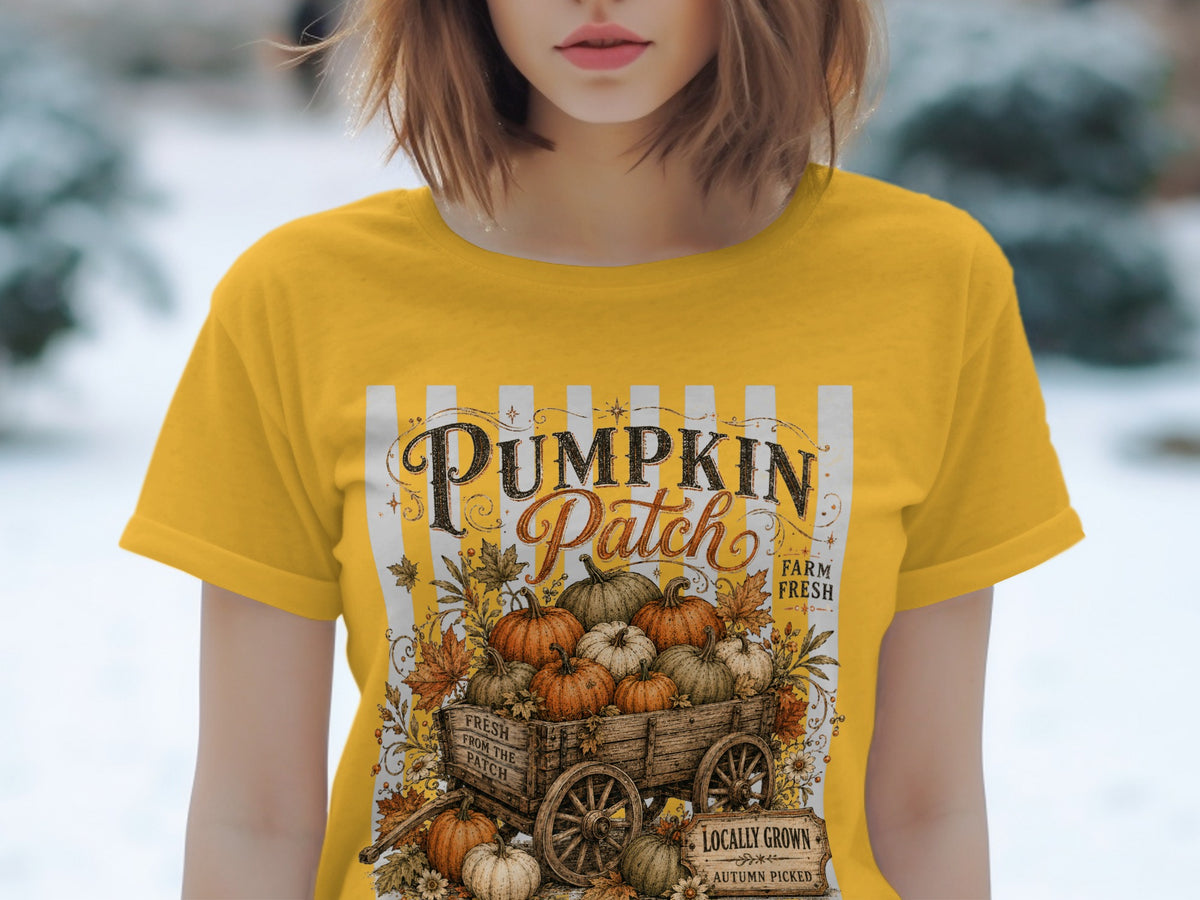 Yellow t-shirt with "Pumpkin Patch Farm Fresh" graphic and wagon of pumpkins.