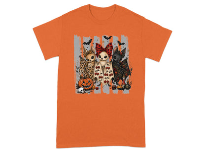 Three cartoon bats dressed for Halloween with a pumpkin and skulls on an orange shirt.