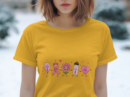 Yellow t-shirt with graphic of smiling balloon, ribbon, flower, water bottle, and heart holding hands.