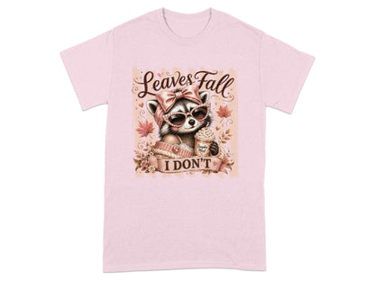 Raccoon in sunglasses and scarf holding pumpkin latte, "Leaves Fall I Don't" text.