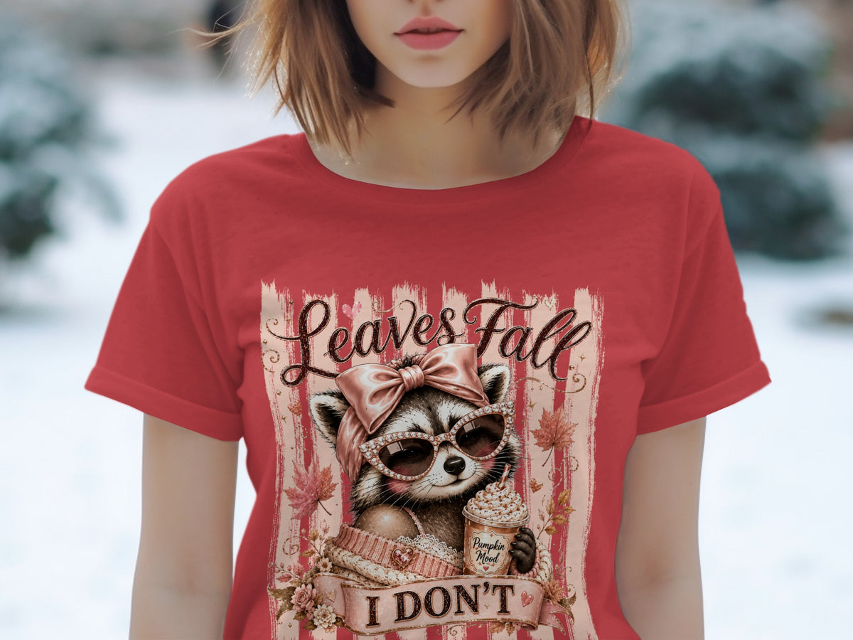Red t-shirt with a graphic of a raccoon in sunglasses holding a coffee drink, with text.