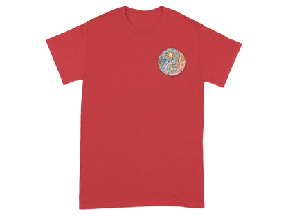 Red t-shirt with embroidered yin yang symbol featuring flowers and smiling suns.