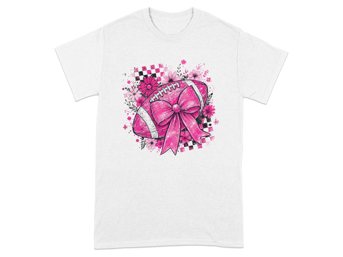 Pink football with ribbon, flowers, and checkered pattern on a white t-shirt.