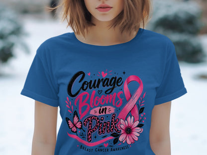 Blue t-shirt with "Courage Blooms in Pink" and breast cancer awareness ribbon design.