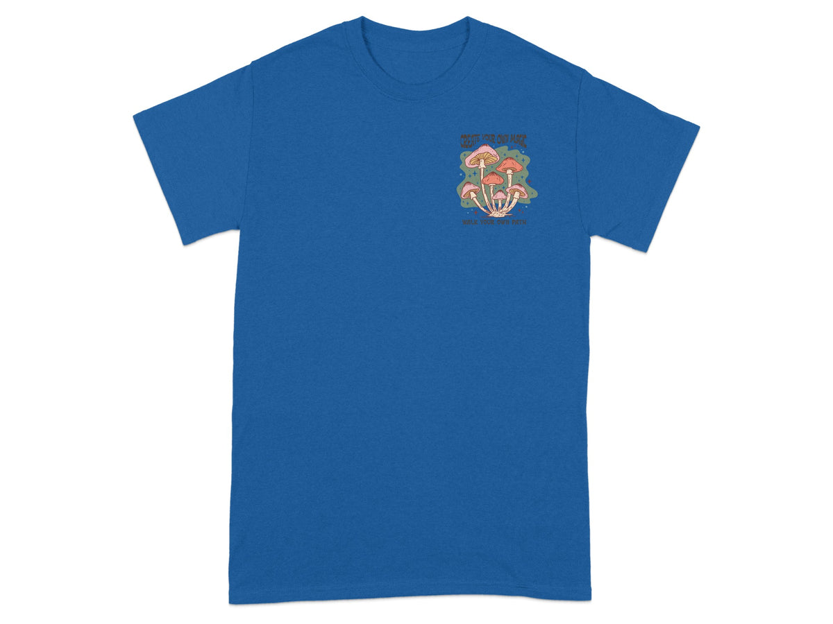 Blue t-shirt with mushroom graphic and text "CREATE YOUR OWN MAGIC".