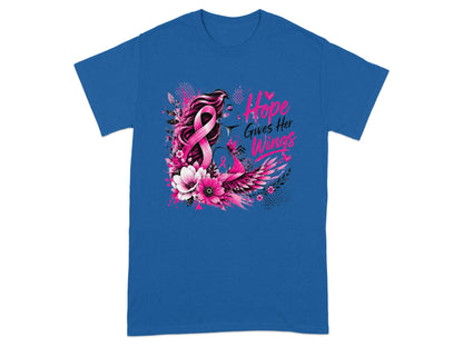 Graphic t-shirt with woman, pink ribbon, flowers, wings, and text "Hope Gives Her Wings."