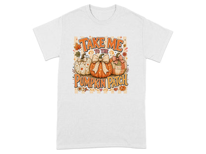 White t-shirt with "Take me to the pumpkin patch" text and three decorative pumpkins.