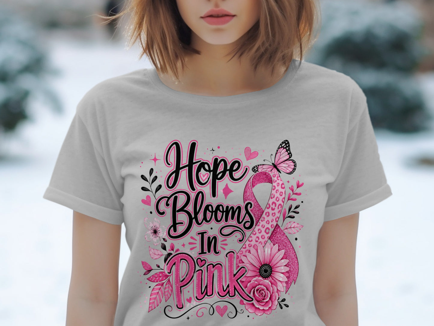 Gray t-shirt with "Hope Blooms In Pink" text, pink ribbon, flowers, and butterfly graphic.