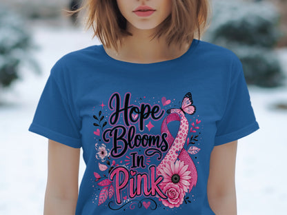 Blue t-shirt with pink "Hope Blooms In Pink" text, butterfly, and floral design.