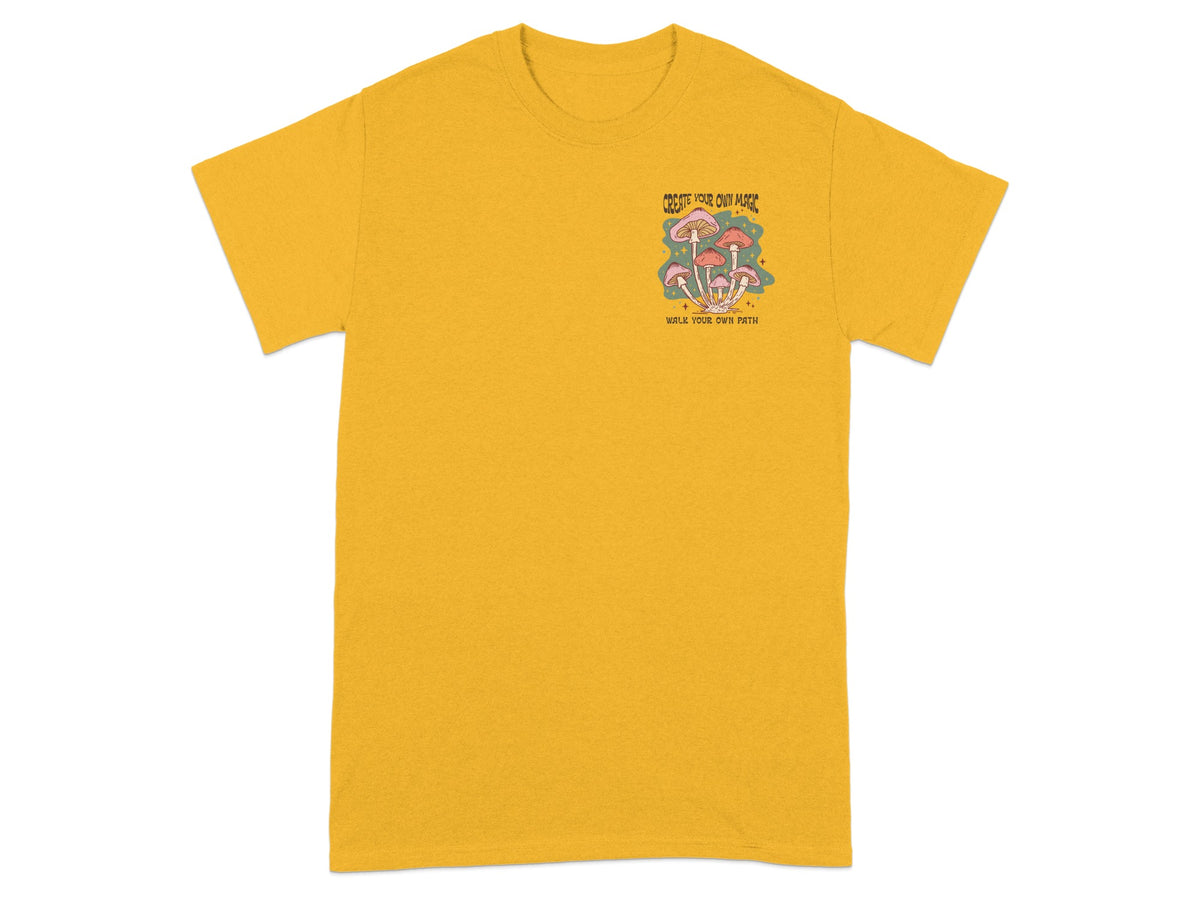 Yellow t-shirt with "Create Your Own Magic" and mushroom design.