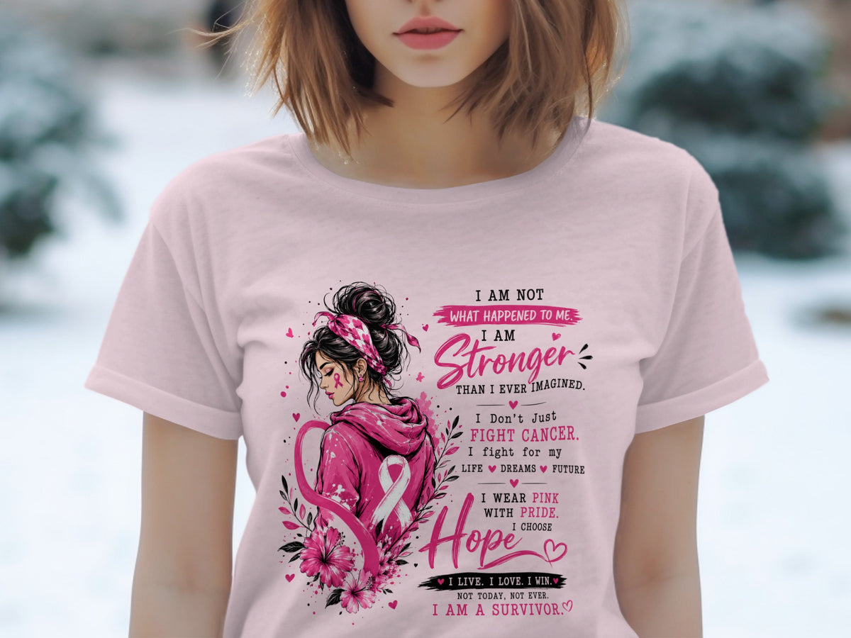 Pink t-shirt with illustration and text about breast cancer survivorship.