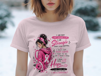 Pink t-shirt with illustration and text about breast cancer survivorship.
