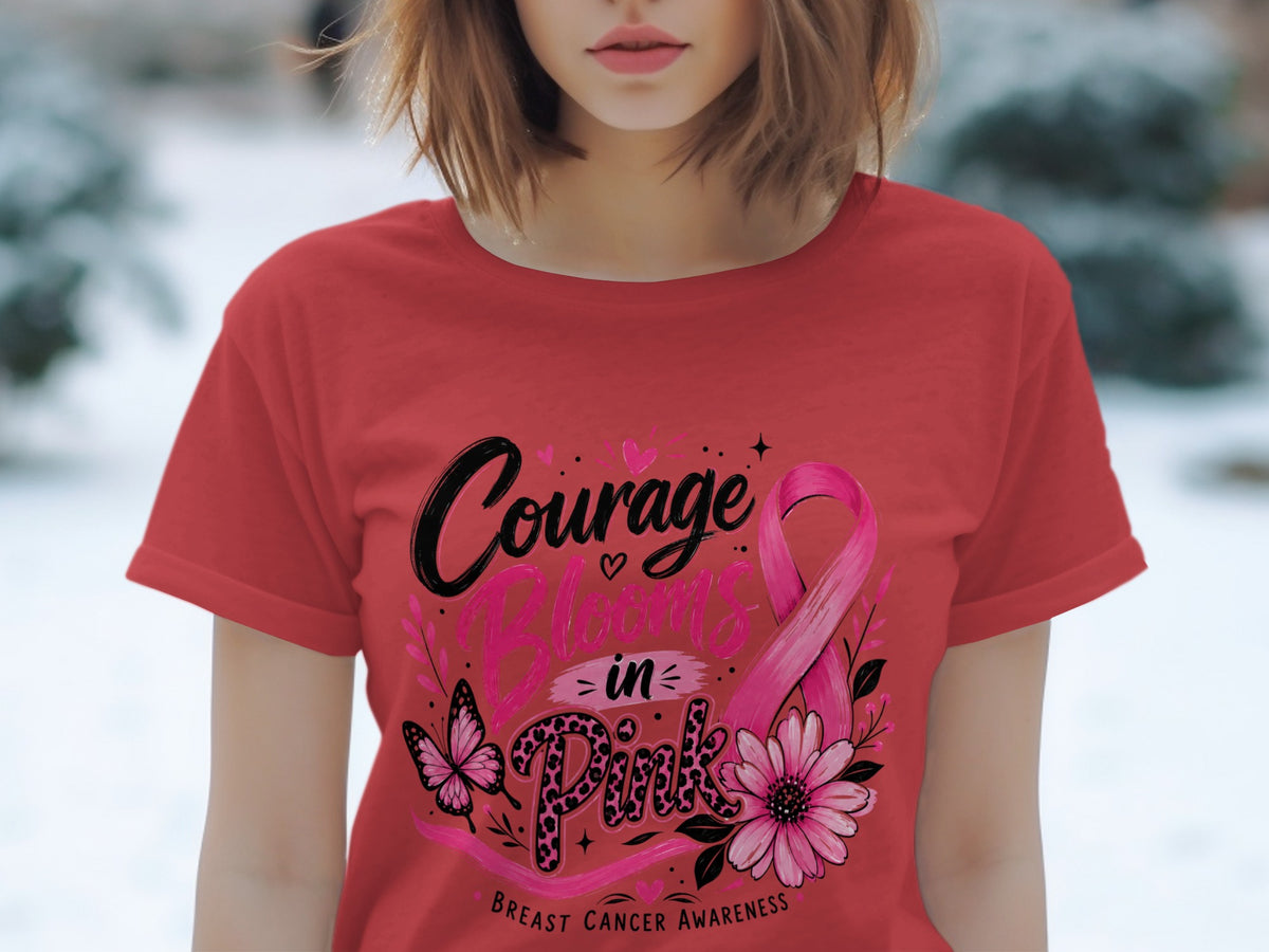 Red t-shirt with "Courage Blooms in Pink" and breast cancer awareness ribbon.