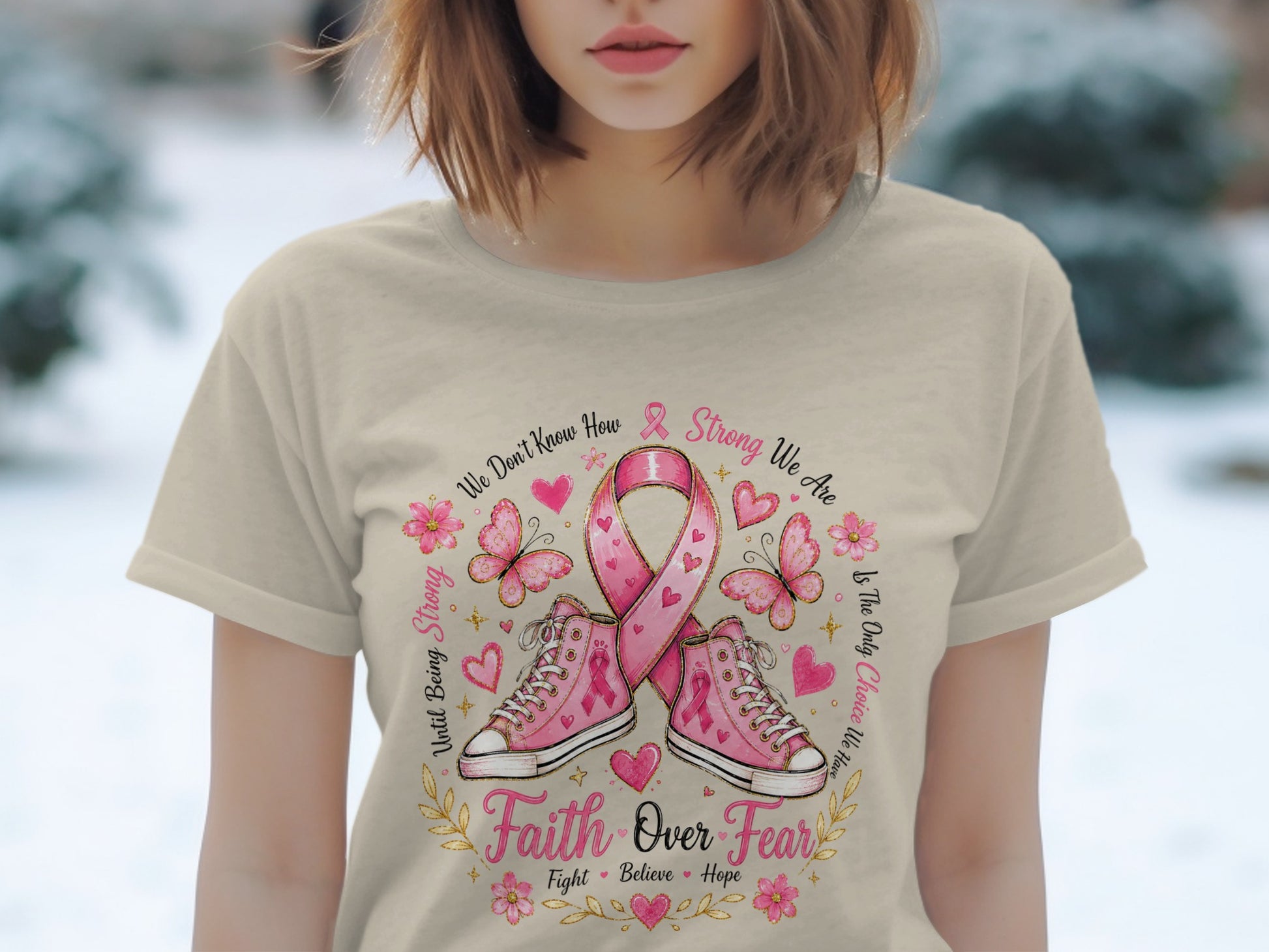 Pink ribbon, butterflies, and shoes with text "Faith Over Fear" and "Strong We Are".