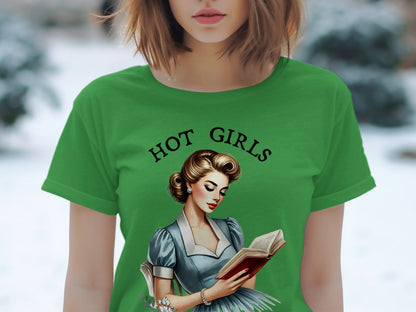 Green t-shirt with "HOT GIRLS" text and pin-up style illustration of woman reading