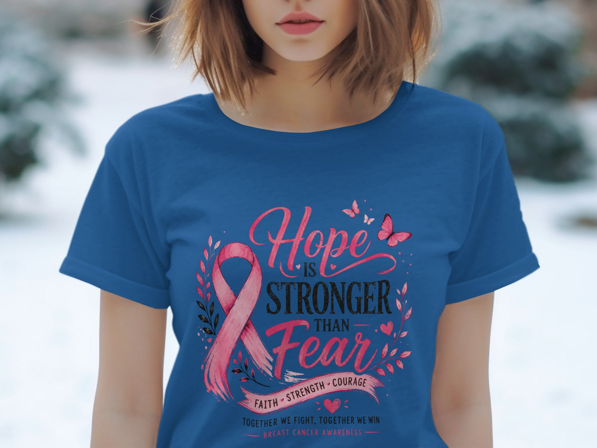 Blue t-shirt with pink ribbon and "Hope is Stronger Than Fear" text.