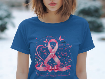 Blue t-shirt with pink breast cancer ribbon, butterflies, heart, and inspirational text.