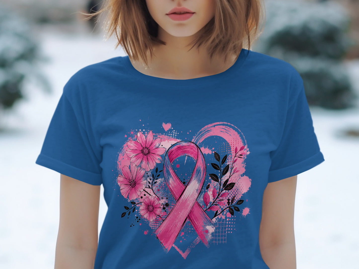 Blue t-shirt with a pink breast cancer ribbon and floral design.
