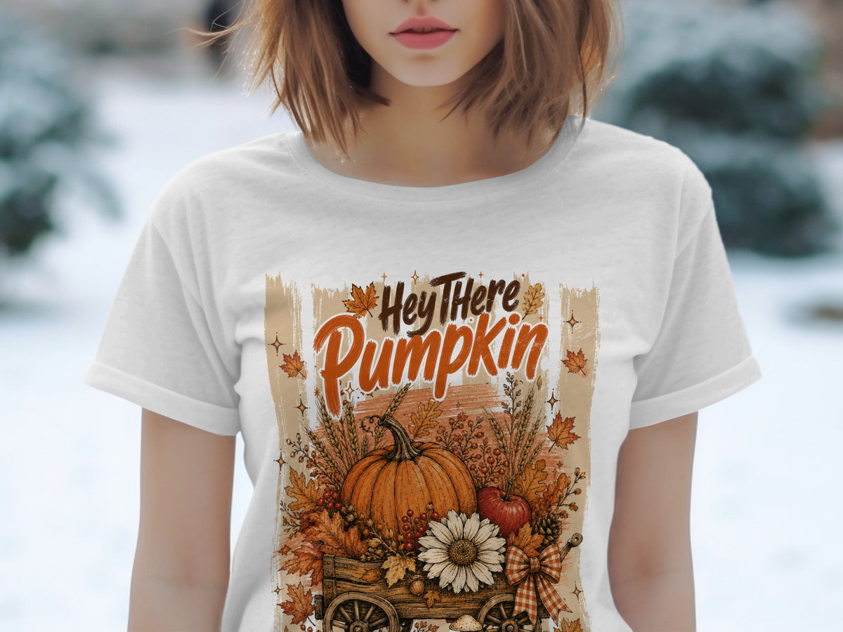 White t-shirt with "Hey There Pumpkin" text and fall harvest graphic.
