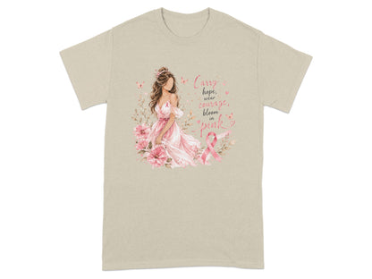 Illustration of woman with flowers and pink ribbon, text reads "Carry hope, wear courage, bloom in pink".