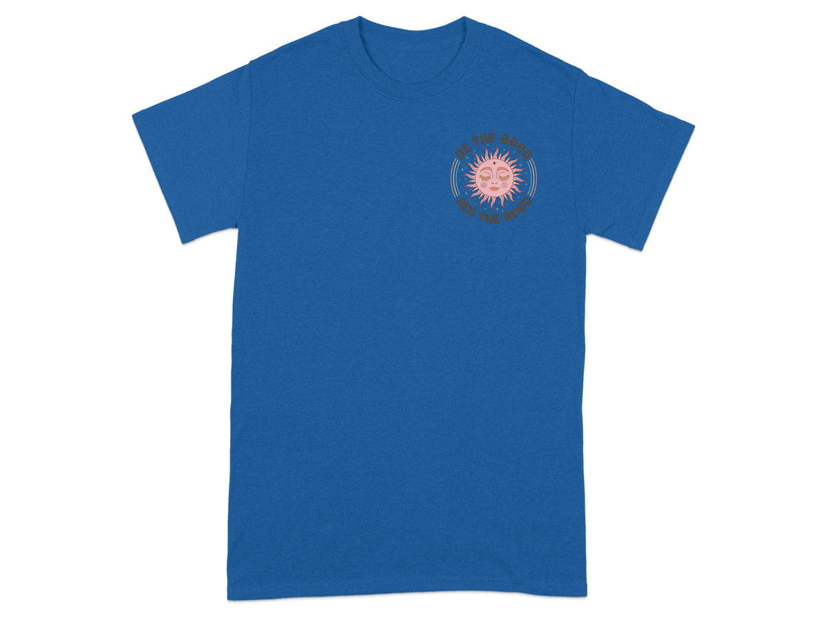 Blue t-shirt with a sun graphic and text "Be the good, see the good."
