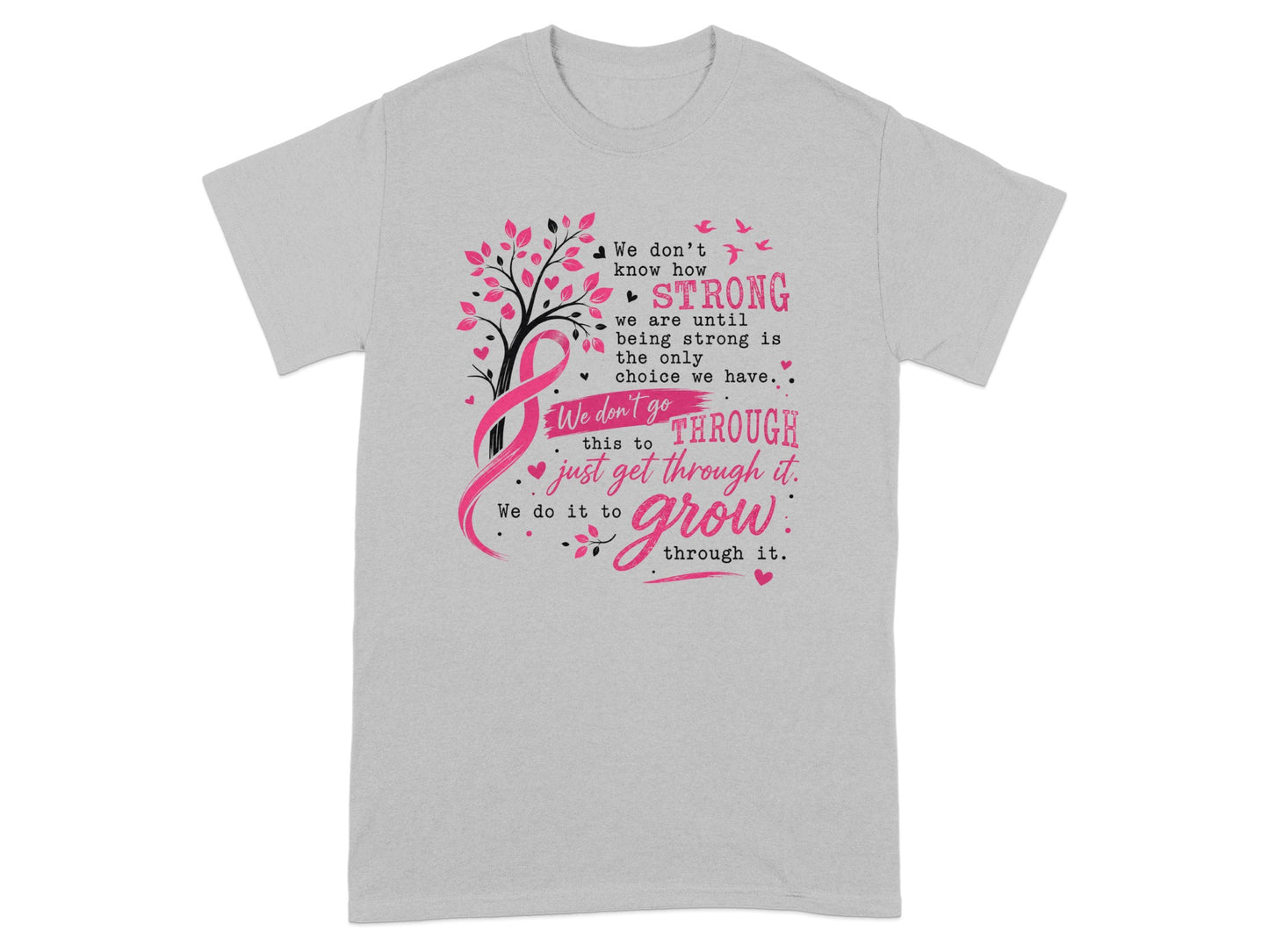 Grey t-shirt with a tree, pink ribbon, birds, and text about being strong.