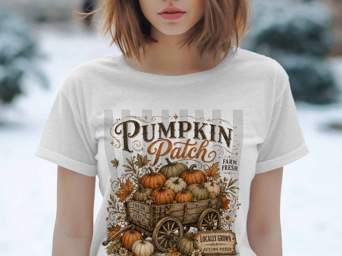 White t-shirt with "Pumpkin Patch" graphic and wagon of pumpkins.