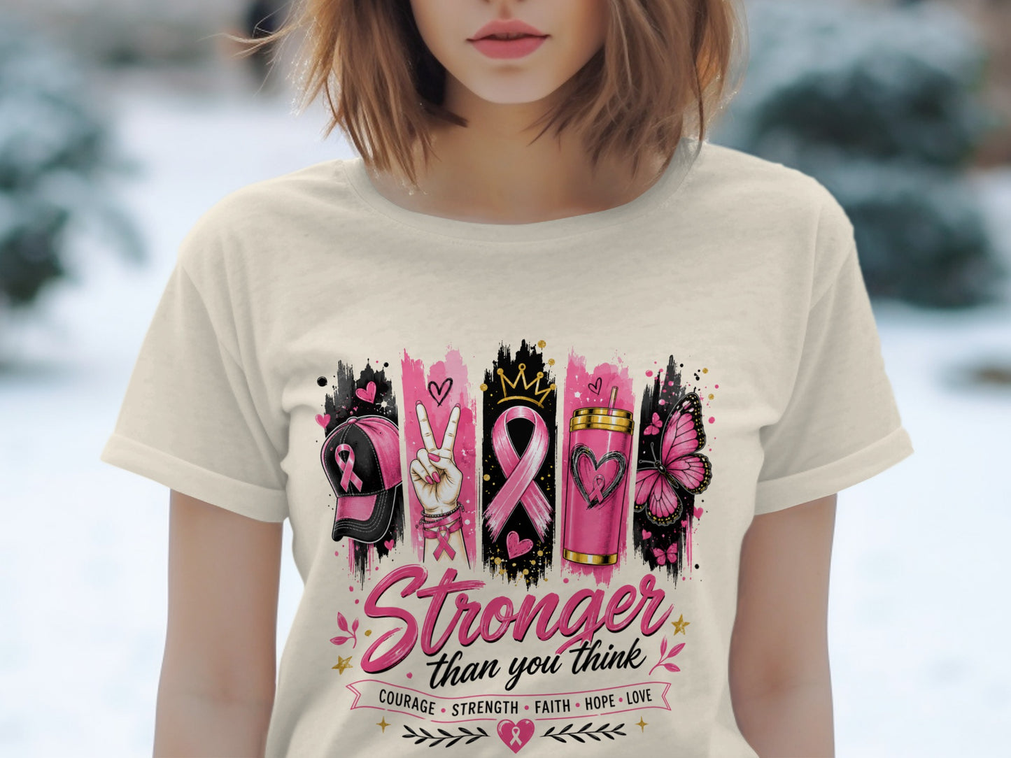 Cream t-shirt with "Stronger than you think" and breast cancer awareness icons.