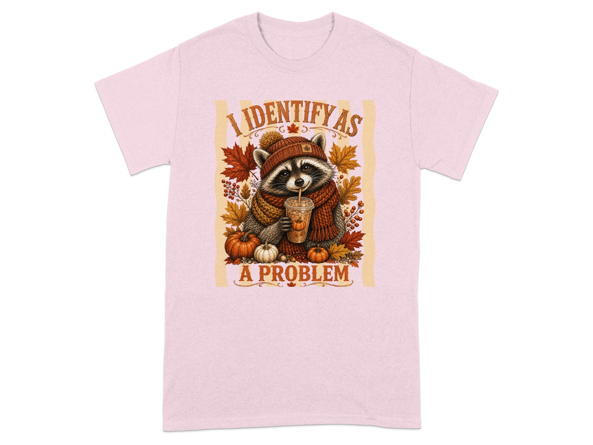 Raccoon in beanie and scarf holding drink, with pumpkins and leaves, text "I IDENTIFY AS A PROBLEM".