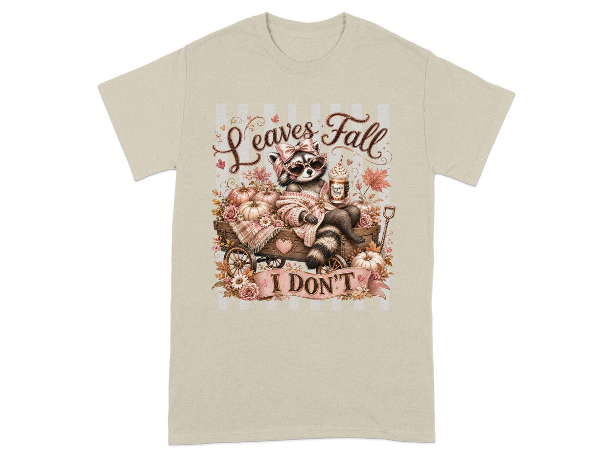 Raccoon with drink and pumpkins with text "Leaves Fall I DON'T".